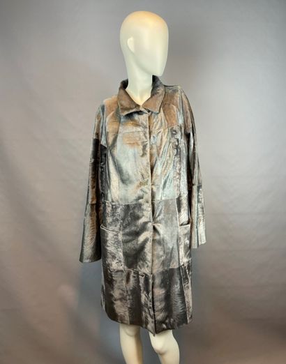 Lot of two coats including :

BALMAIN

-...