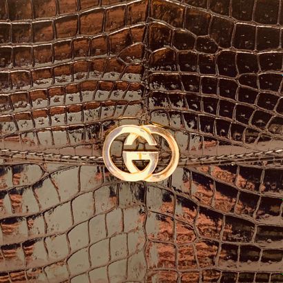 GUCCI

Sac en cuir imitation crocodile bleu...