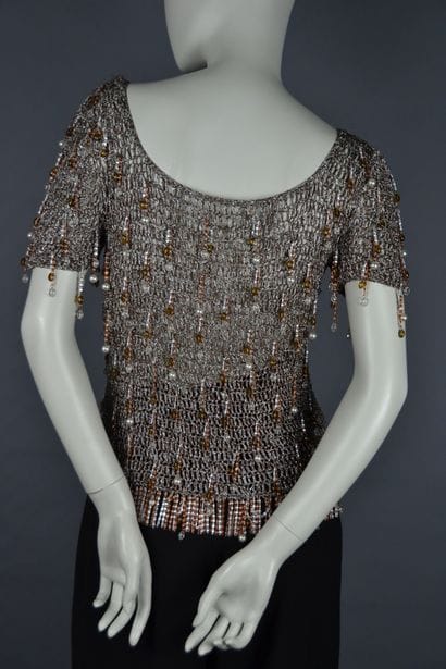Loris AZZARO

Top en mailles de lurex bronze...