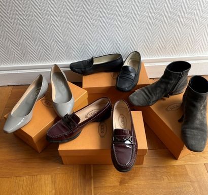TOD'S

Four pairs of shoes in their box,...