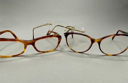 Lot of glasses including : 

PRADA. Eyeglasses,...
