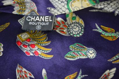 CHANEL

Blouse sans manche en soie à motifs...