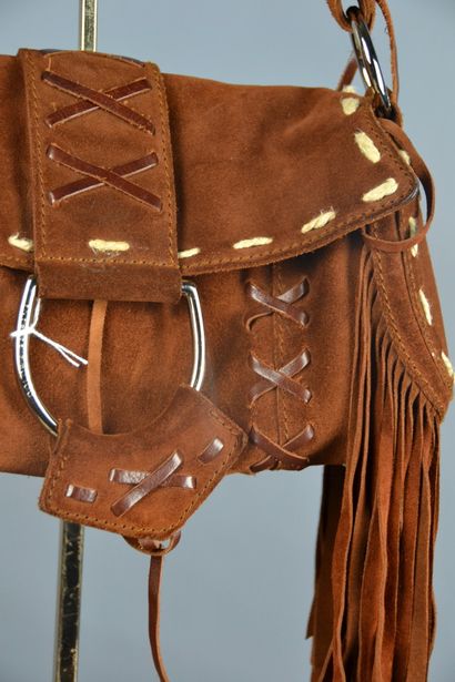*DOLCE & GABANNA

Sac baguette en daim marron...