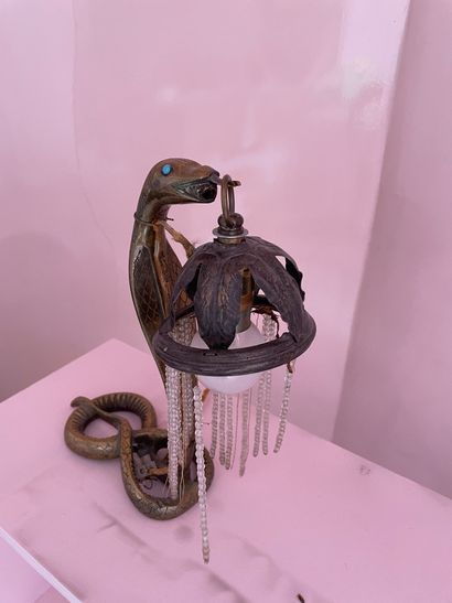 Lampe en métal figurant un serpent 

Hauteur...
