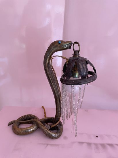 Lampe en métal figurant un serpent 

Hauteur...