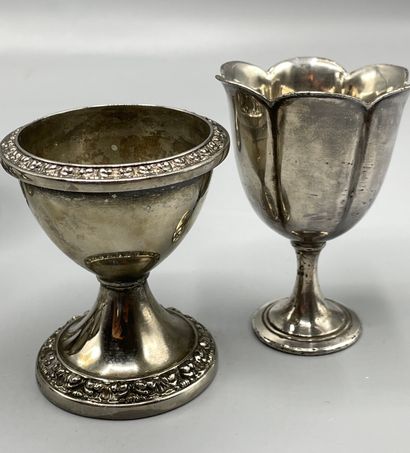 Set of five silver plated egg cups, the top...