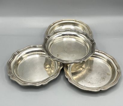 Four silver plated bottle coasters of curved...