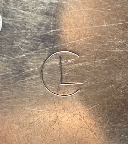 Four silver plated bottle coasters of curved...