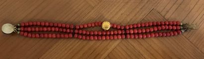 Bracelet with three rows of red coral pearls,...