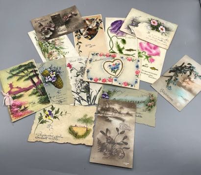 A set of postcards including paper cutouts,...
