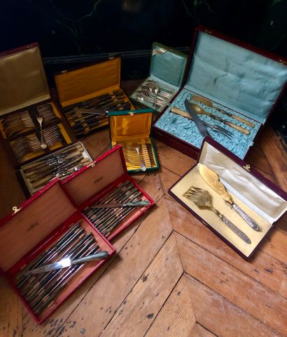 NINE silver plated cutlery boxes in their...