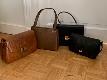 Set of four leather handbags