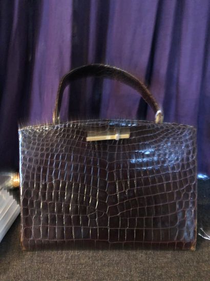 Sac en cuir noir imitation croco

Sac en...