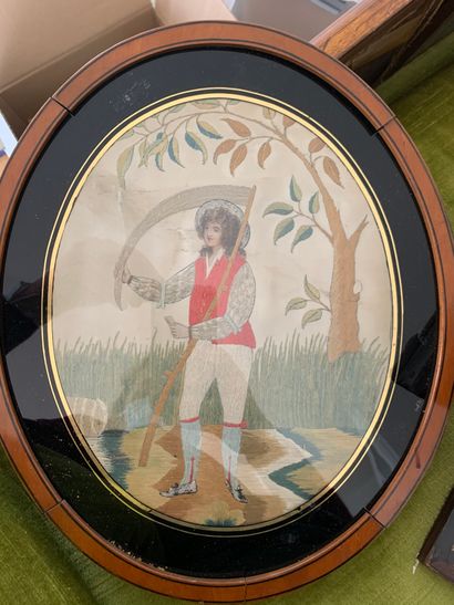 The harvester, embroidery with oval view...