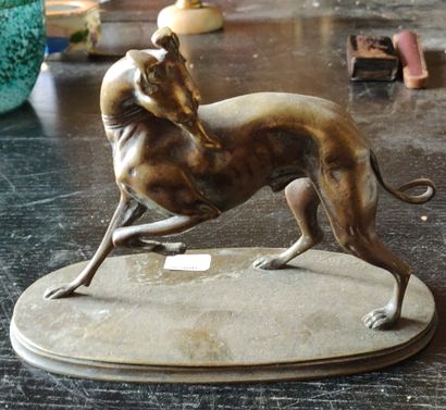 After BARYE, statuette representing a dog...