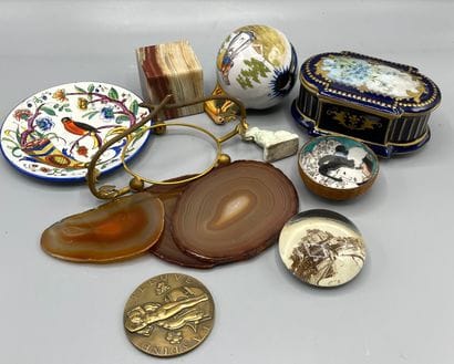 A lot of trinkets including: hard stones,...