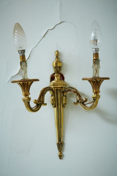 A pair of Louis XVI style bronze sconces...
