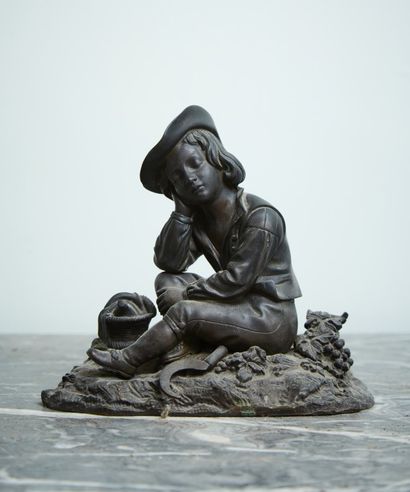 Bronze statuette with brown patina representing...
