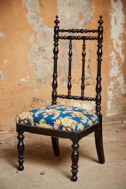 Low chair in blackened wood, tapestry with...