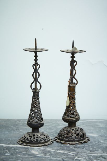 Pair of copper picks with openwork decoration...