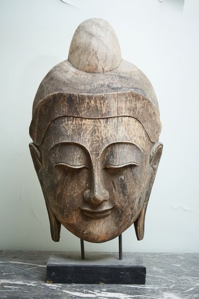 Large Buddha head in carved wood, modern...
