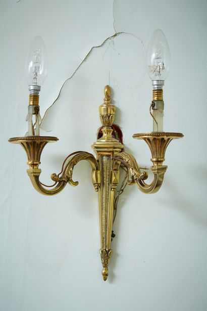 A pair of Louis XVI style bronze sconces...