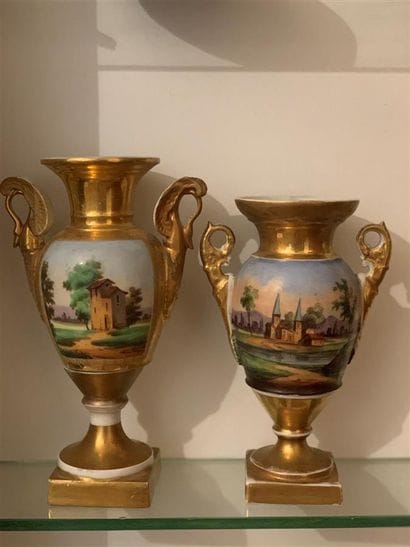 Deux vases en porcelaine polychrome et dorée...