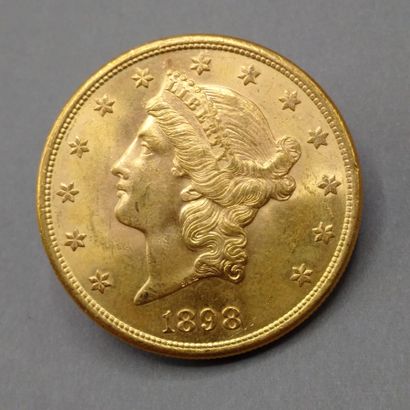 
ETATS-UNIS




Une pièce de 20 Dollars or,...