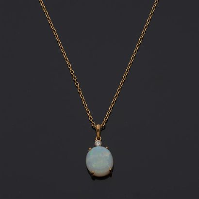 
Pendentif et chaîne en or jaune 18 K (750...