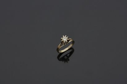 Bague en or gris 18K (750 millièmes) sertie...
