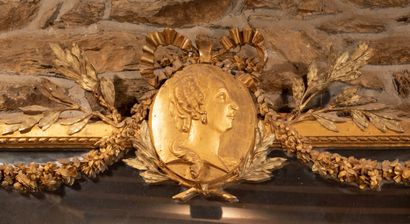 
Important carved and gilded wood mirror...
