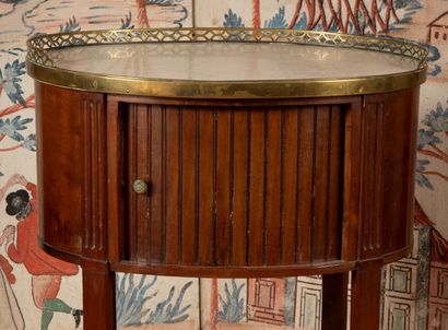 
Mahogany and mahogany veneer bedside table,...
