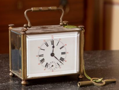 
Travel alarm clock in brass, white enamel...
