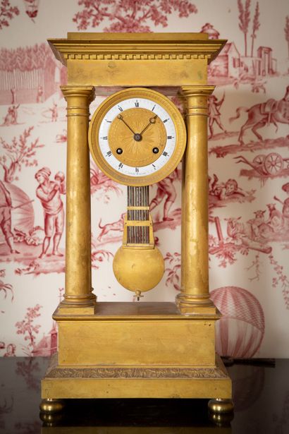 
Portico clock in gilded bronze representing...