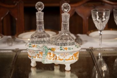 
Two handled earthenware oil and vinegar...