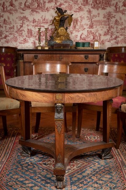 
Round tripod pedestal table in mahogany...