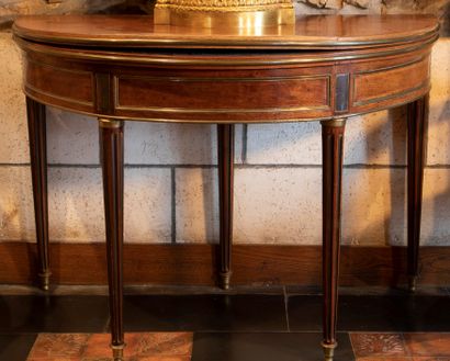 
Mahogany and mahogany veneer half-moon table...