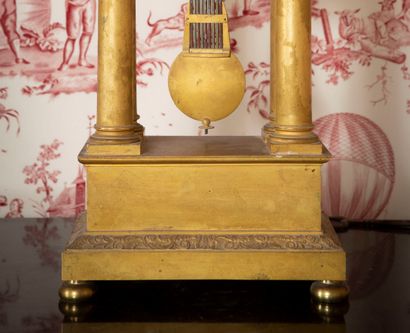 
Portico clock in gilded bronze representing...