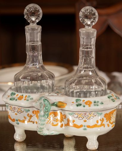 
Two handled earthenware oil and vinegar...
