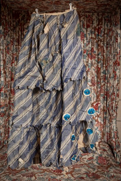 
Two dresses and a skirt from the end of...