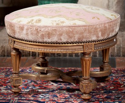 
Round stool in molded and carved wood with...