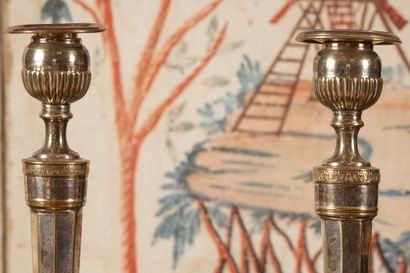 
Pair of candlesticks in silvered bronze,...