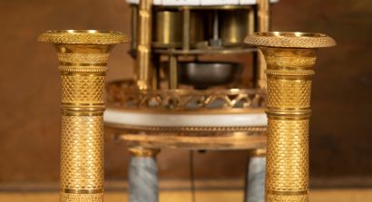 
Pair of ormolu torches with chased fish...