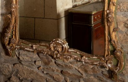 
Important carved wood mirror with green...