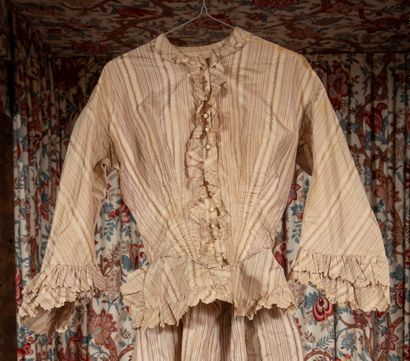 
Two dresses and a skirt from the end of...