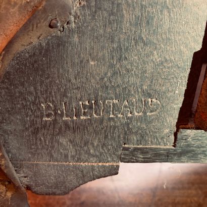 
Carved and red lacquered wood cartel and...