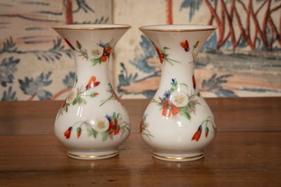 
Pair of white opaline glass vases decorated...