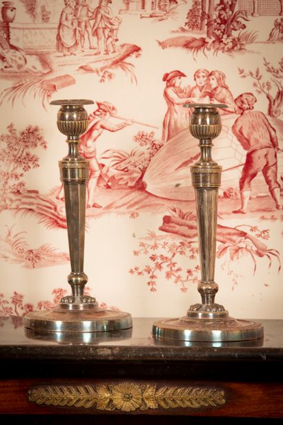 
Pair of silver plated bronze torches decorated...