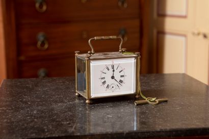 
Travel alarm clock in brass, white enamel...
