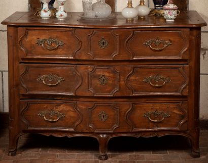 
Natural wood chest of drawers opening to...